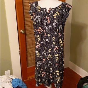 Lack polka dot dress with flowers. Never worn.